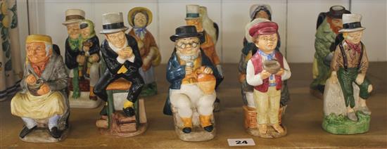 12 small Dickens figures